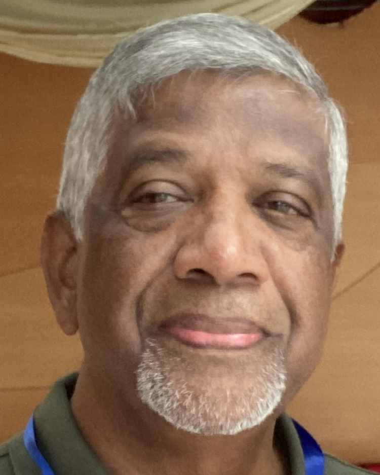 Д-р Тайги Надесан